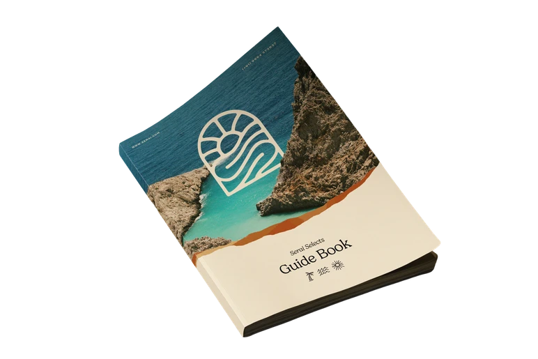 Go North guide book with a coastal landscape on its cover